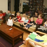 From left to right: Isaiah, Gabe, Zane, Ming Ming (front), Julian, Avital, Anissa, Lilly, Oscar, Lukas, Kiwi (back), Nourit, Kaius, and Avi